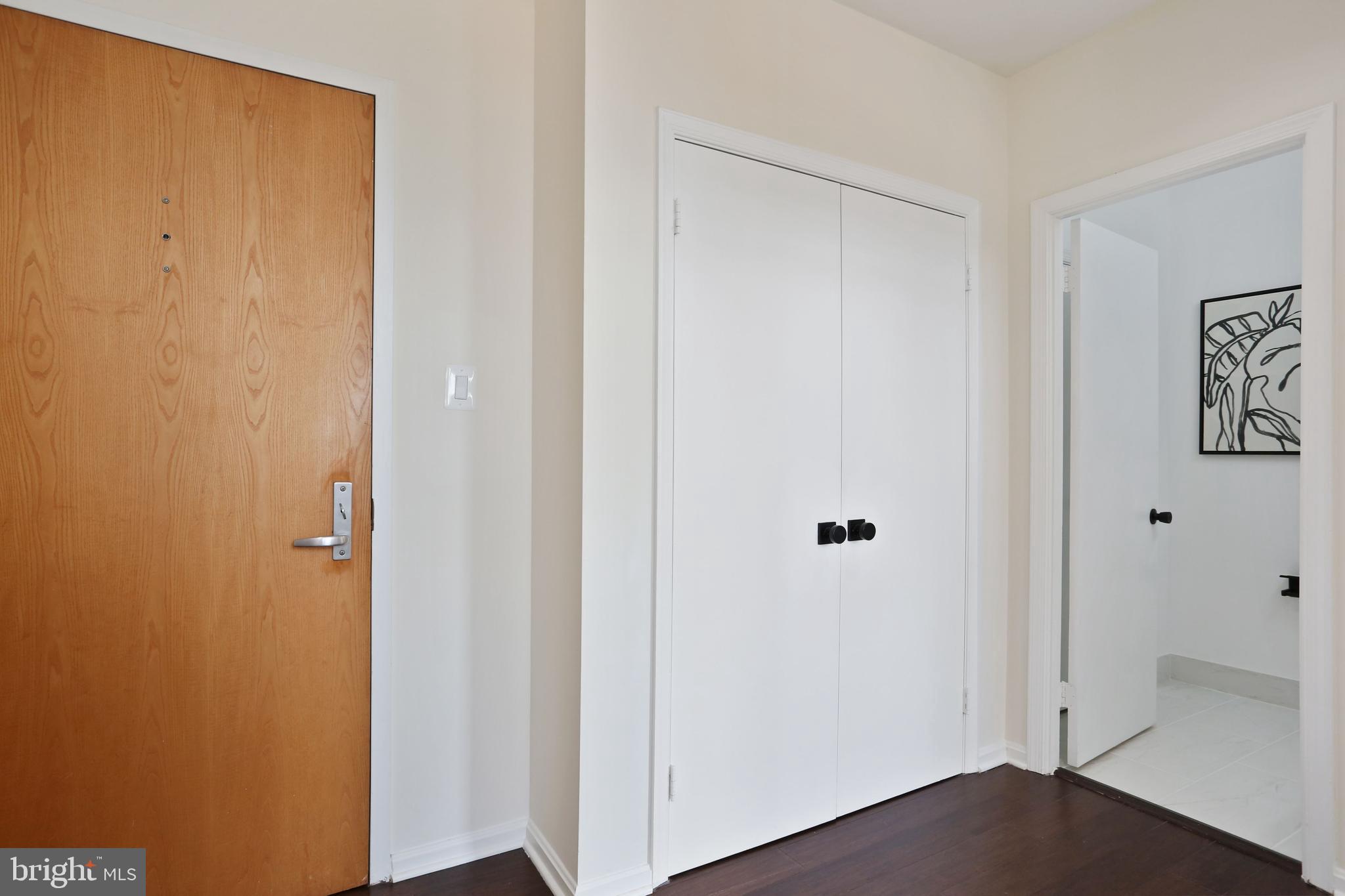 3299 K Street Northwest, Unit 702 Washington, DC 20007 - Photo 21 of 31 Coat Closet at Entryway
