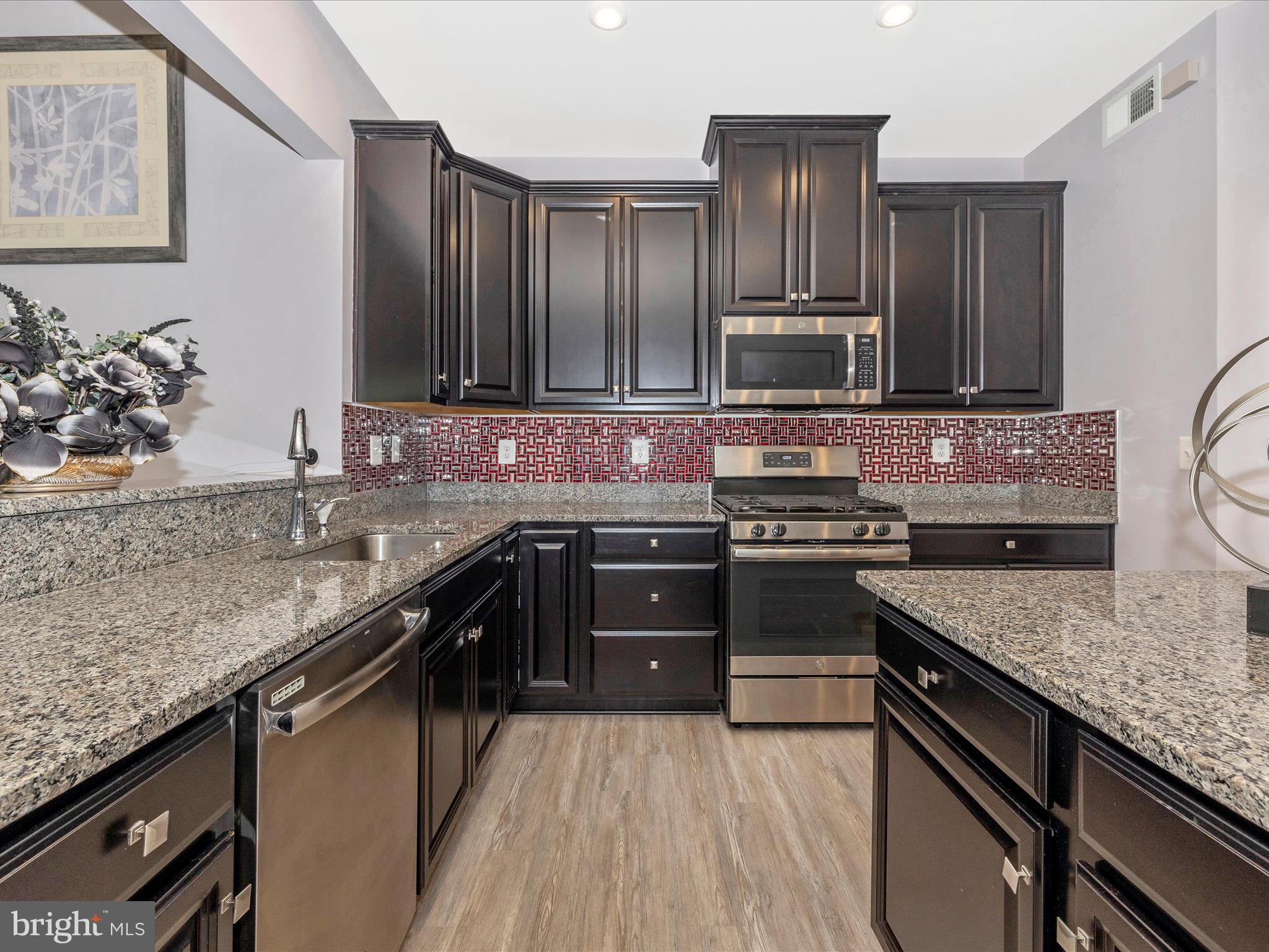 2004 Quandary Drive Frederick, MD 21702 - Photo 13 of 47 a kitchen with a stove and a sink
