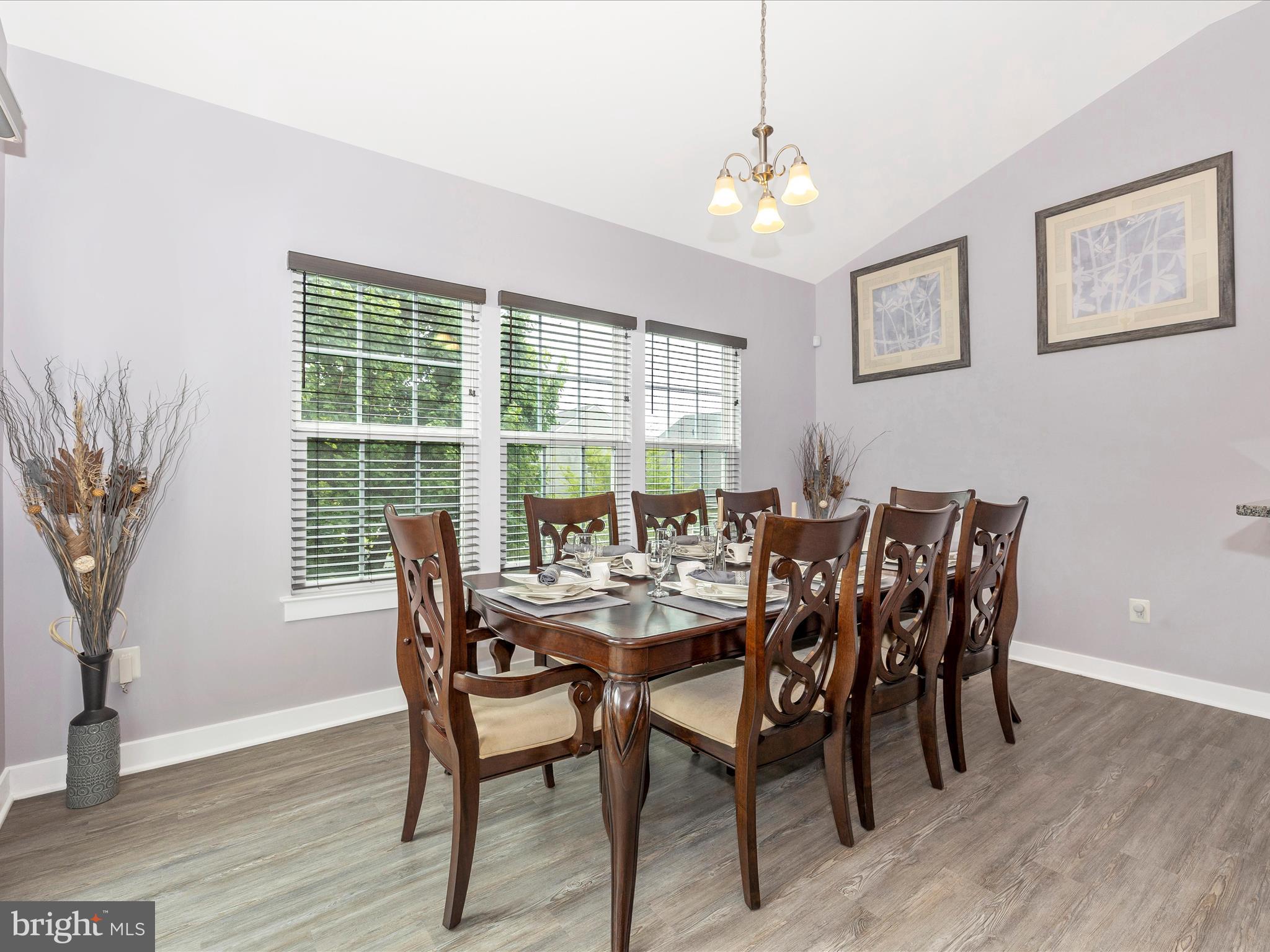 2004 Quandary Drive Frederick, MD 21702 - Photo 14 of 47 a view of a dining room with furniture window and wooden floor