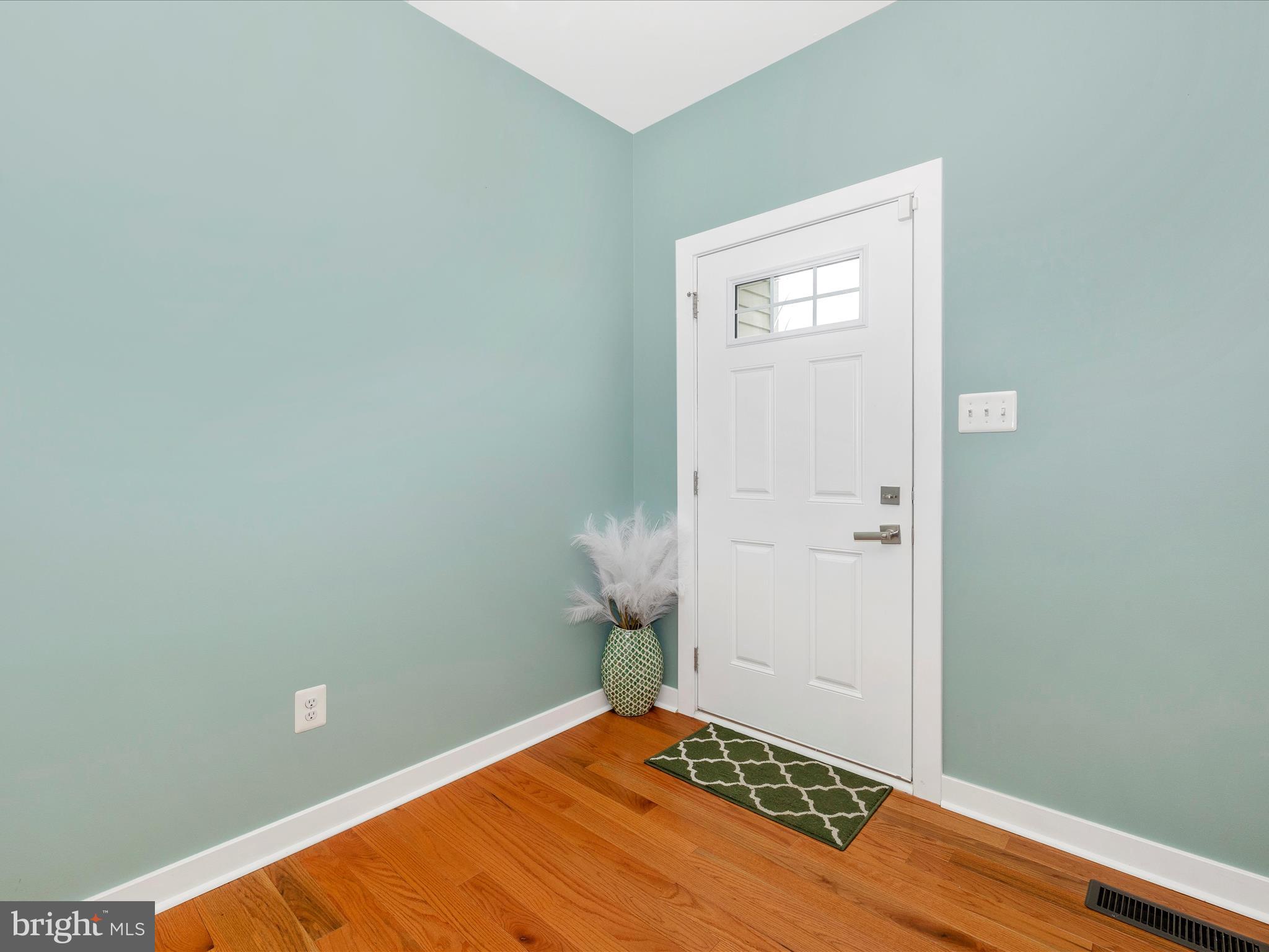 2004 Quandary Drive Frederick, MD 21702 - Photo 2 of 47 a view of a room with wooden floor and cabinet