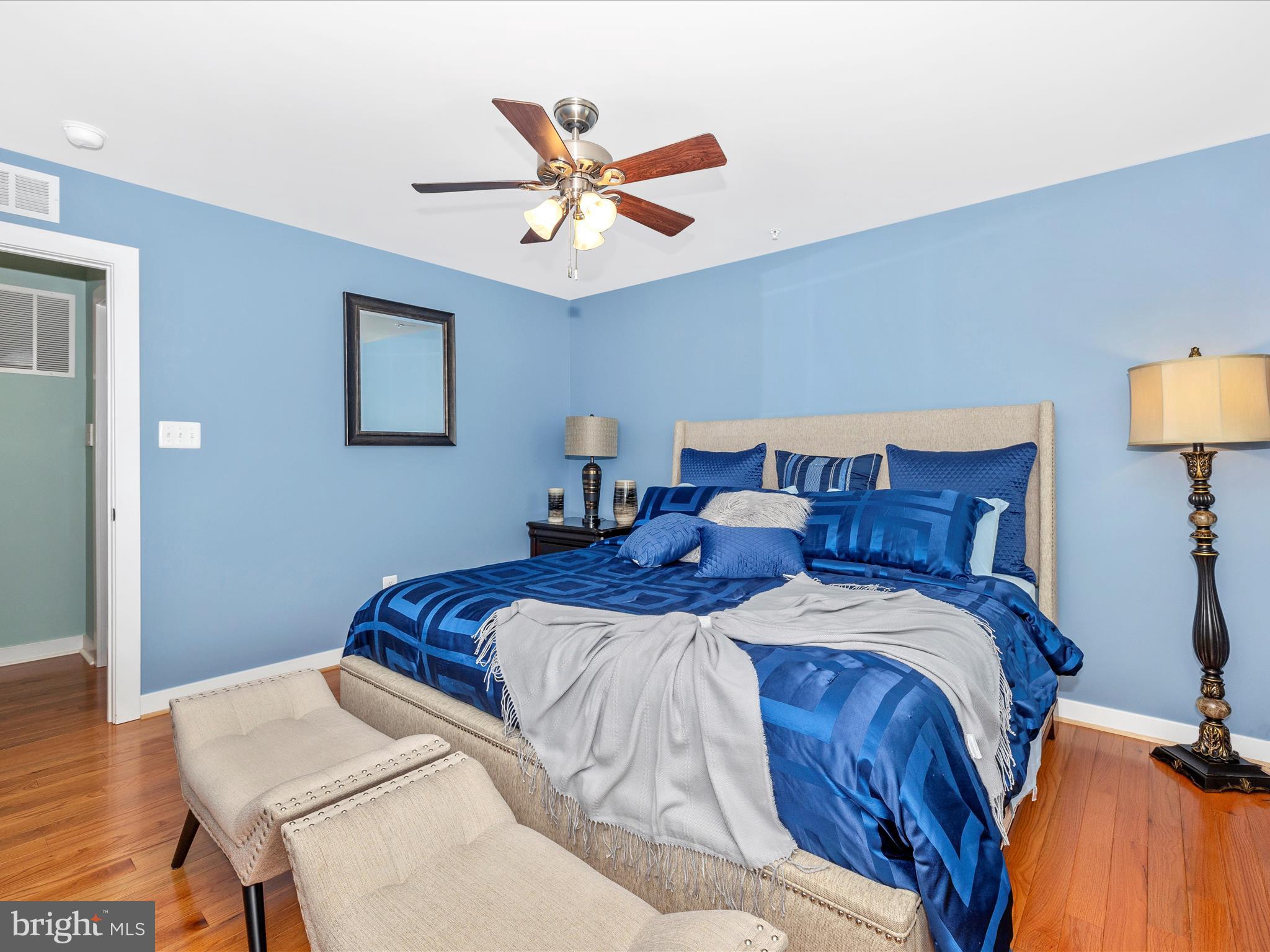 2004 Quandary Drive Frederick, MD 21702 - Photo 24 of 47 a bed room with a bed and a chandelier