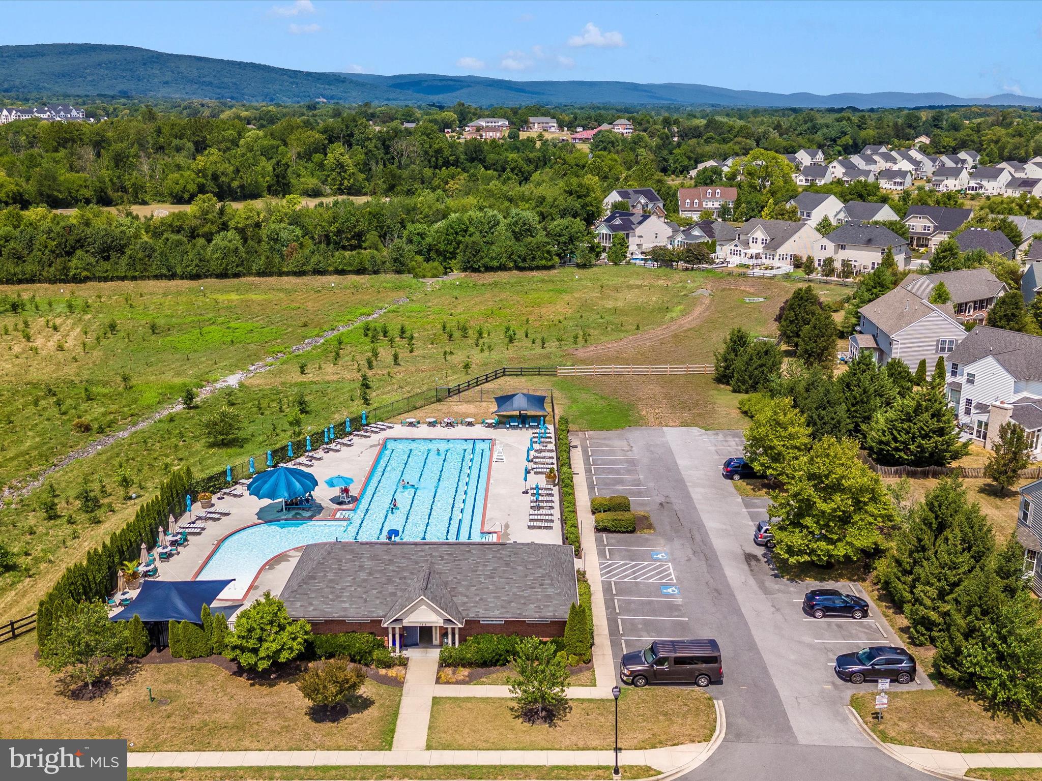 2004 Quandary Drive Frederick, MD 21702 - Photo 38 of 47 an aerial view of residential houses with outdoor space and swimming pool