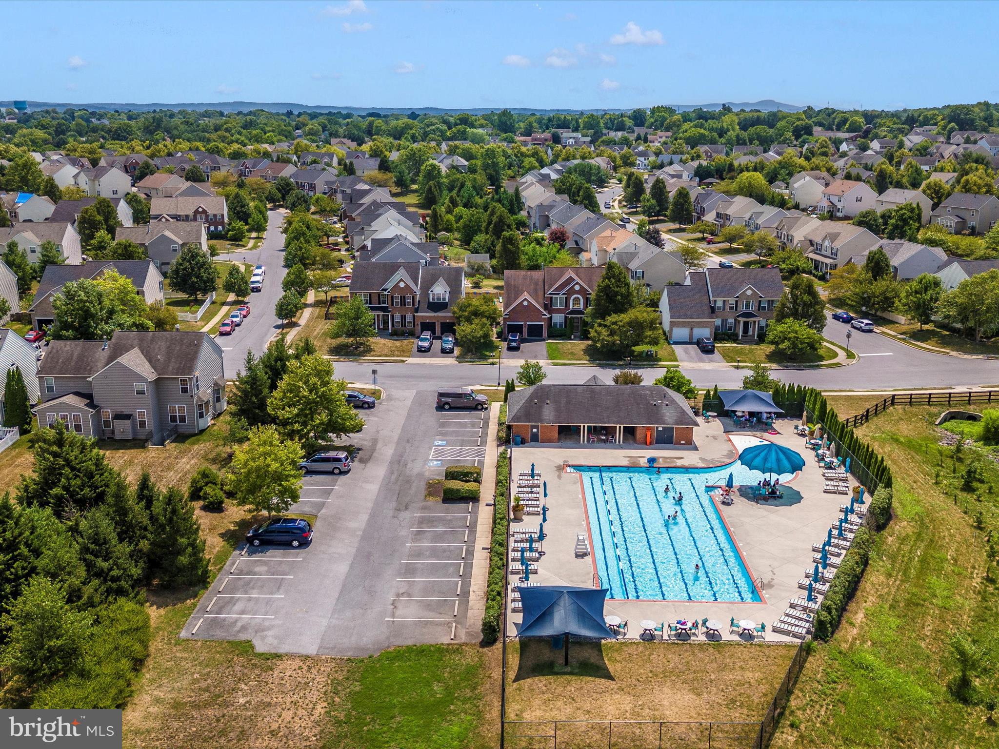 2004 Quandary Drive Frederick, MD 21702 - Photo 40 of 47 an aerial view of a house with a swimming pool outdoor seating and yard
