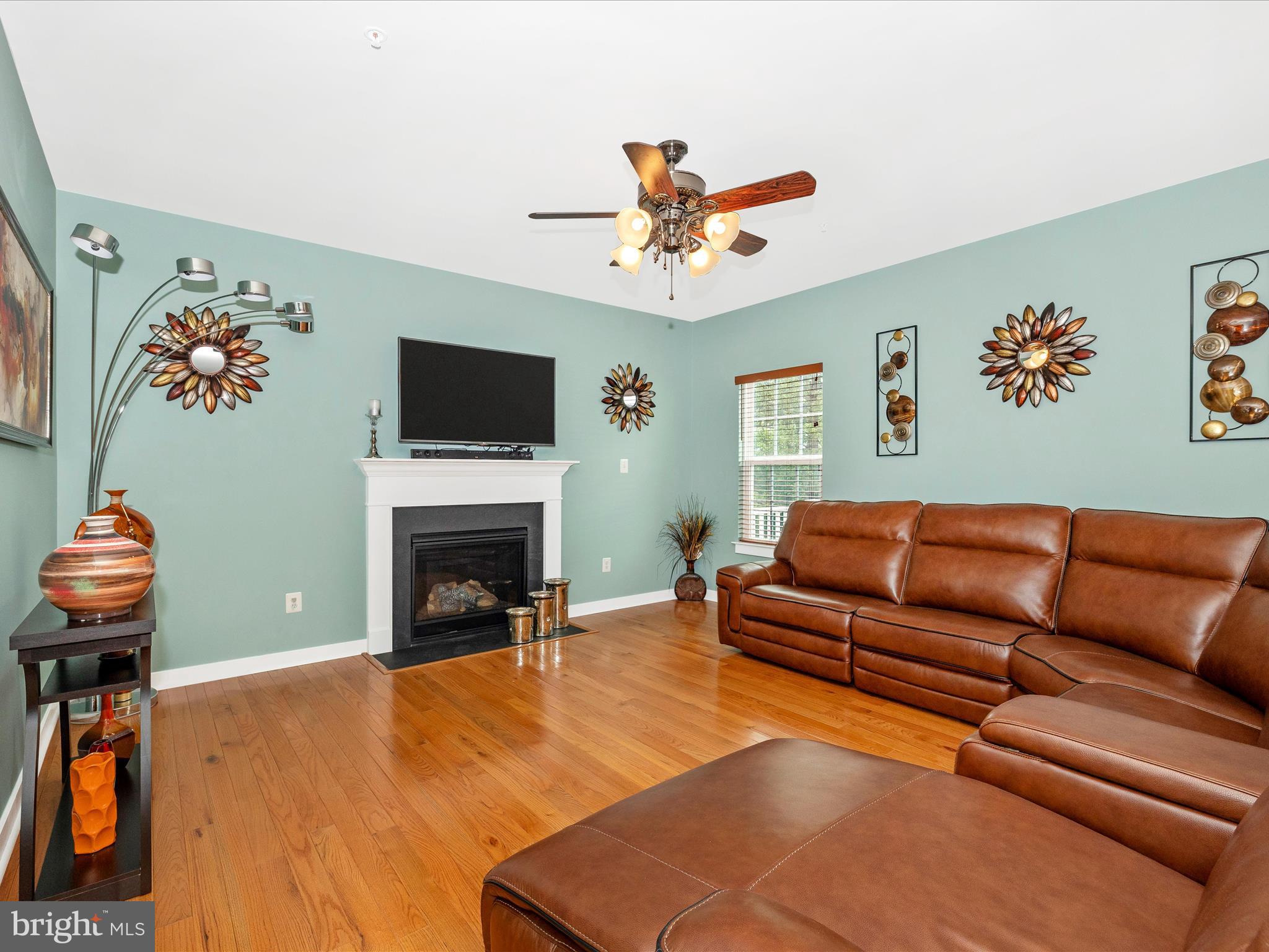 2004 Quandary Drive Frederick, MD 21702 - Photo 6 of 47 a living room with furniture a fireplace and a flat screen tv