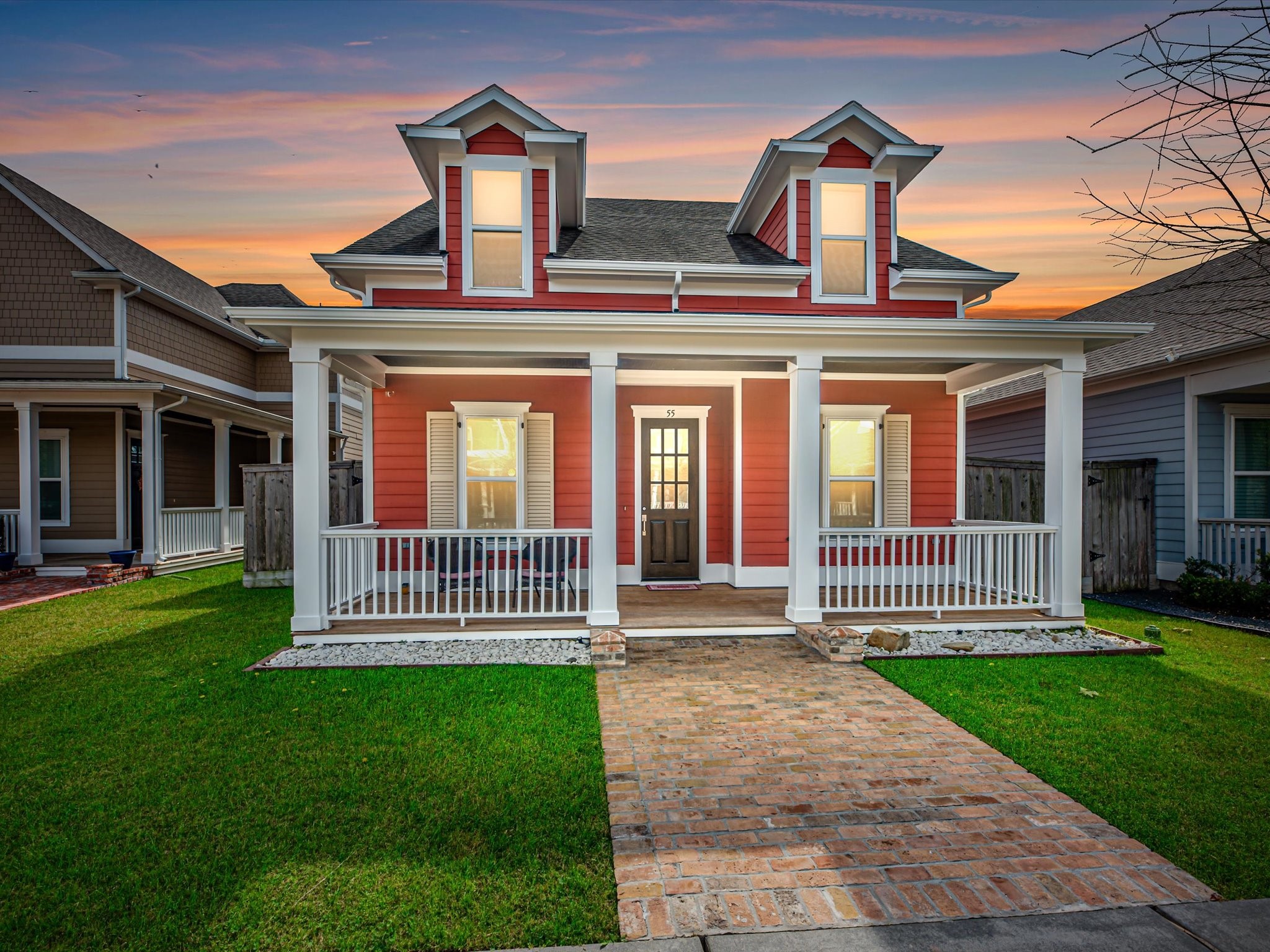 front view of a house with a yard
