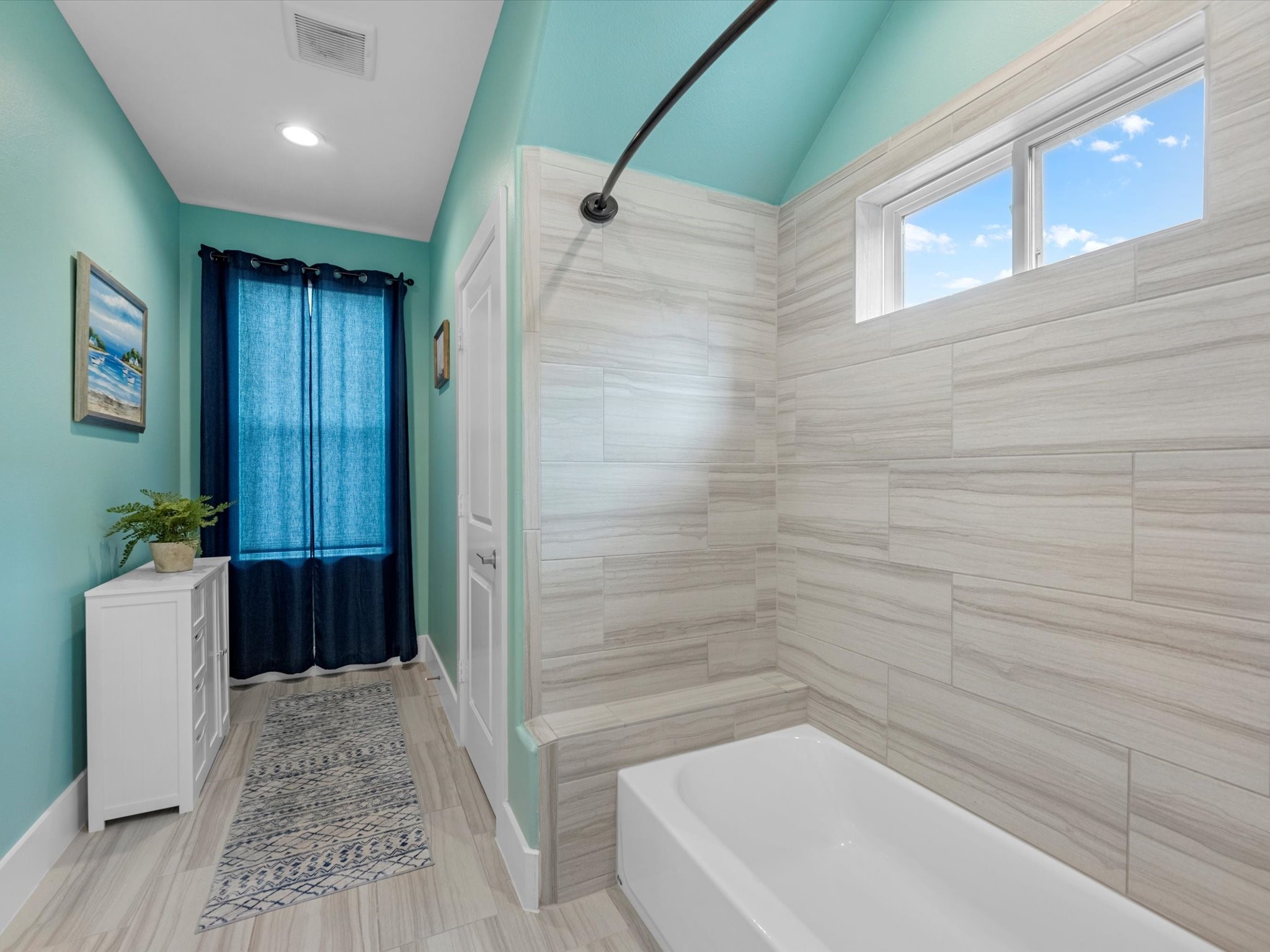 55 Red Harper Drive Spring, TX 77389 - Photo 20 of 28 a bathroom with a bathtub and a shower