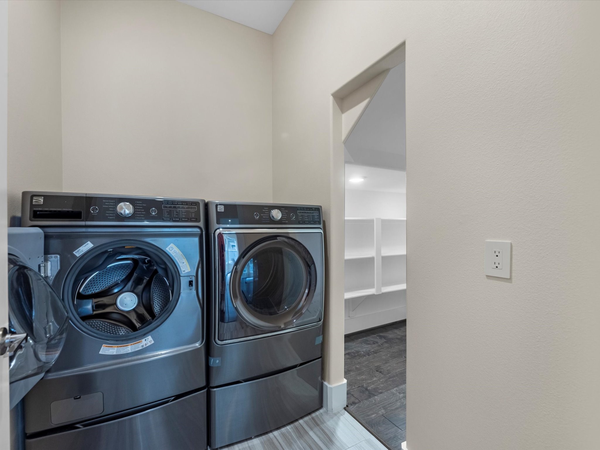 55 Red Harper Drive Spring, TX 77389 - Photo 22 of 28 a utility room with dryer and washer