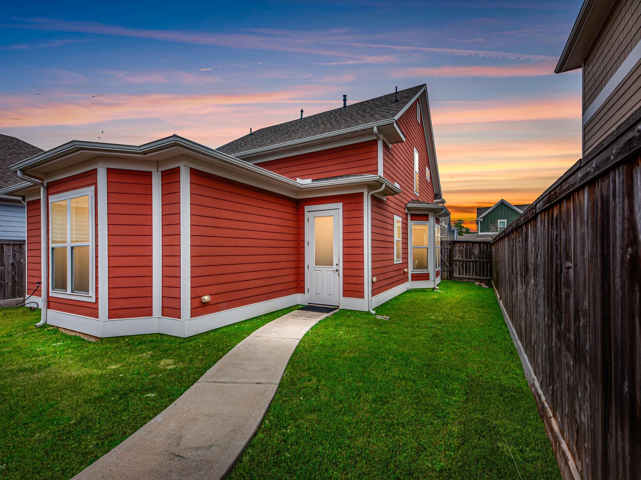 55 Red Harper Drive Spring, TX 77389 - Photo 27 of 28 a front view of a house with garden