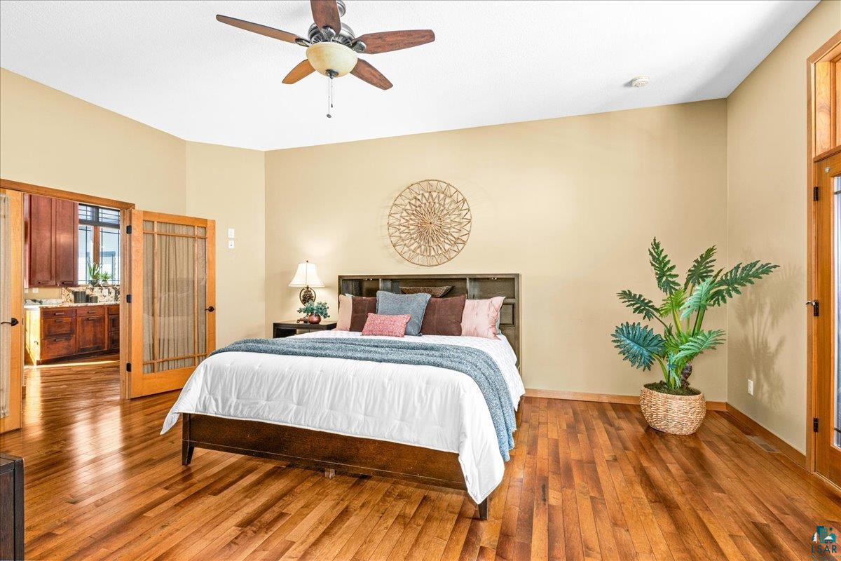 92598 Spells Road Sturgeon Lake, MN 55783 - Photo 27 of 60 Bedroom featuring hardwood / wood-style flooring and ceiling fan