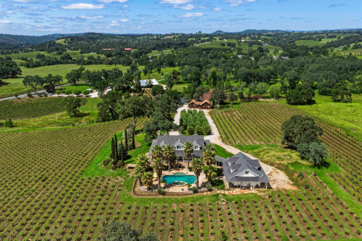 10120 Shenandoah Road Plymouth, CA 95669 - Photo 80 of 86 an aerial view of a house with a yard and lake view