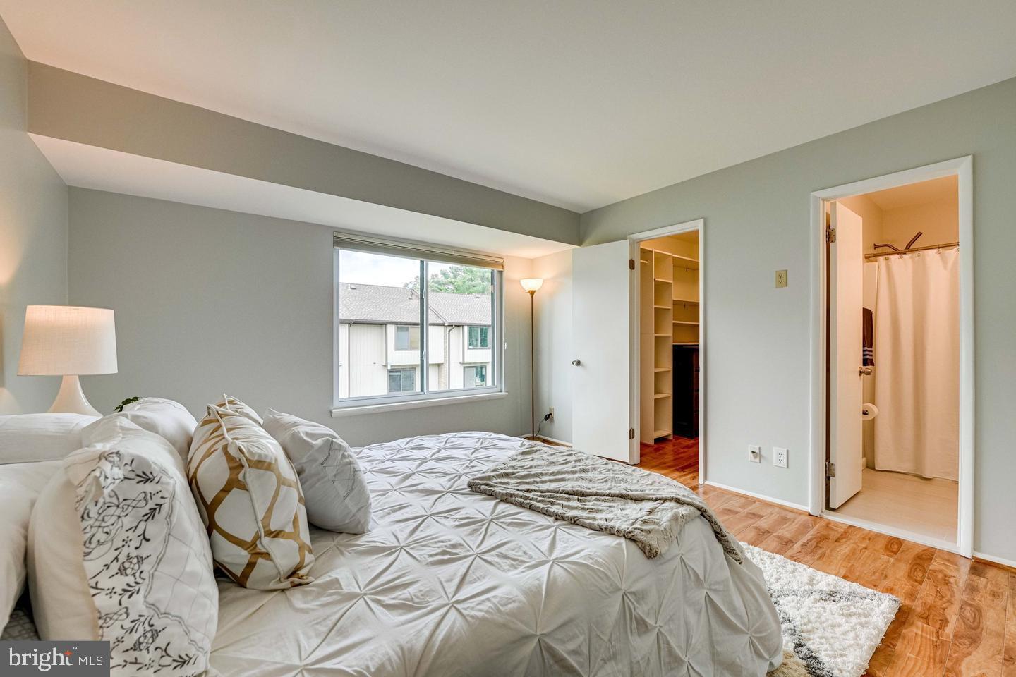 1805 Westwind Way, Unit 55 McLean, VA 22102 - Photo 14 of 30 a bedroom with a bed and a window