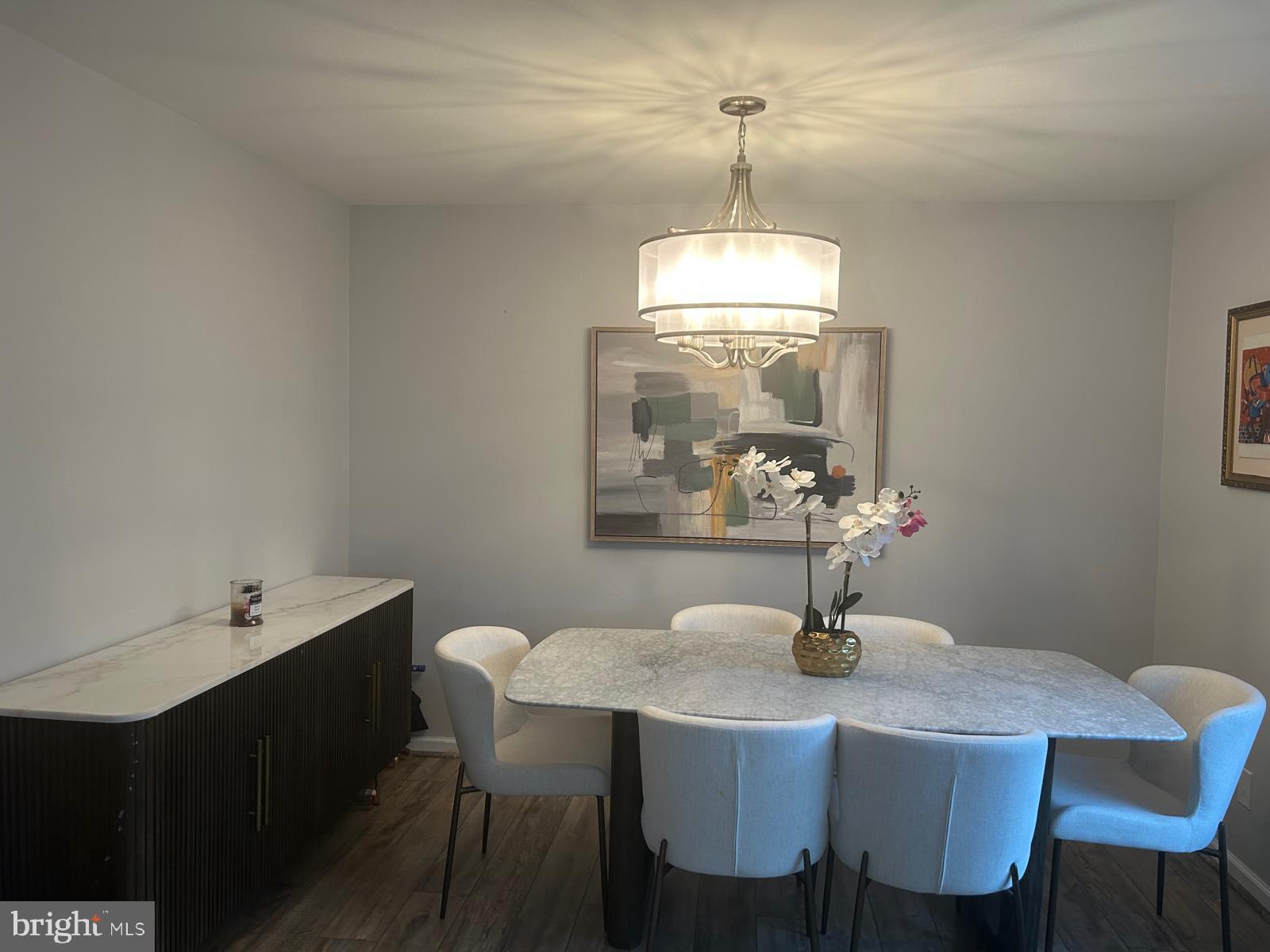 1805 Westwind Way, Unit 55 McLean, VA 22102 - Photo 8 of 30 a view of a dining room with a table and chairs