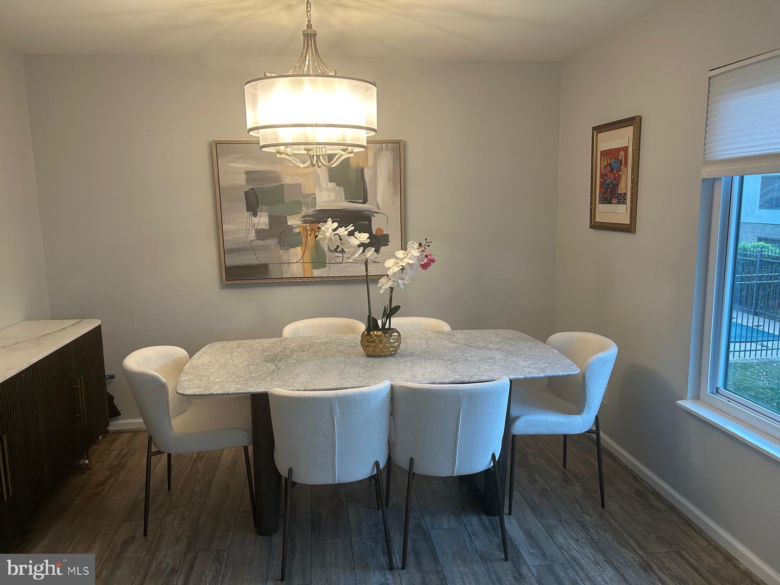 1805 Westwind Way, Unit 55 McLean, VA 22102 - Photo 10 of 30 a view of a dining room with furniture window and outside view