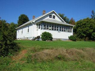 5439 Broad Shoals Road Riner, VA 24149 - Photo 1 of 2 a front view of a house with a yard