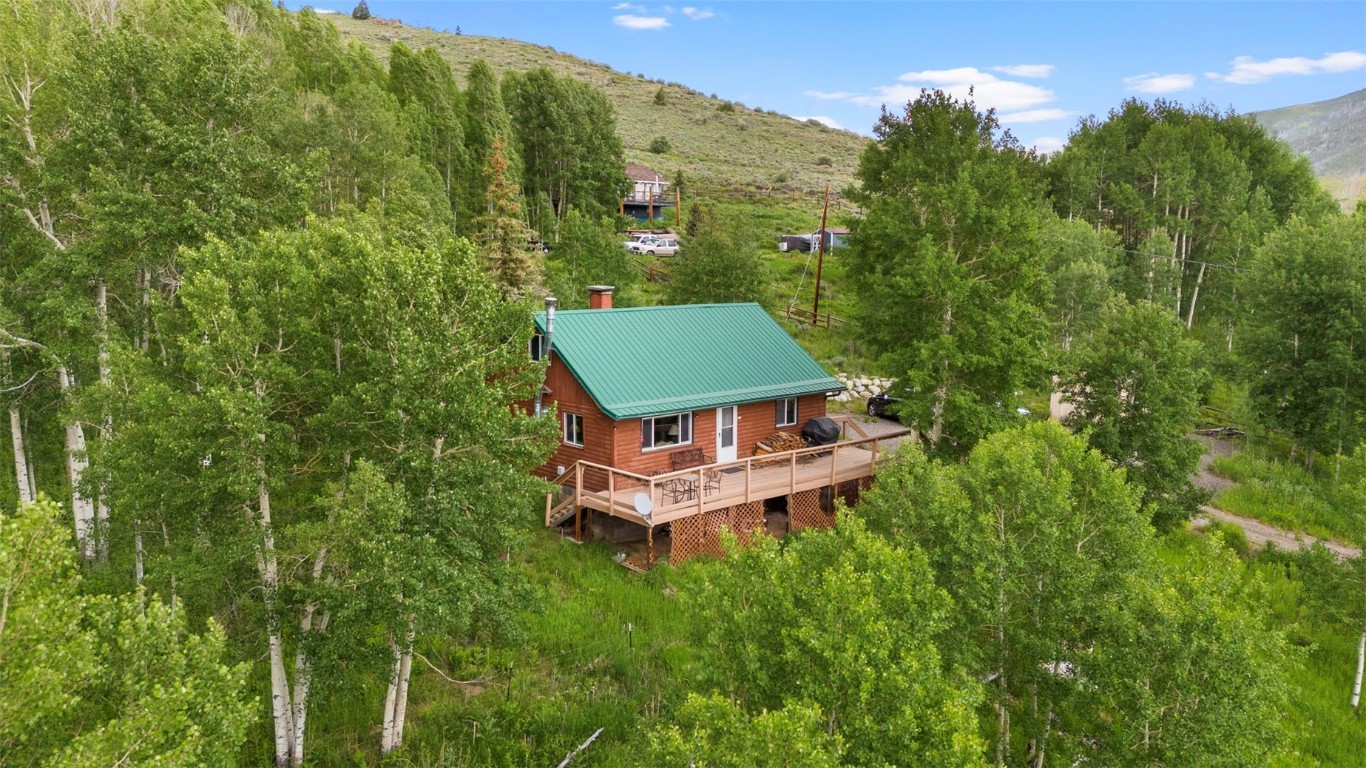 473 J Road Silverthorne, CO 80498 - Photo 1 of 38 a aerial view of a house with a yard