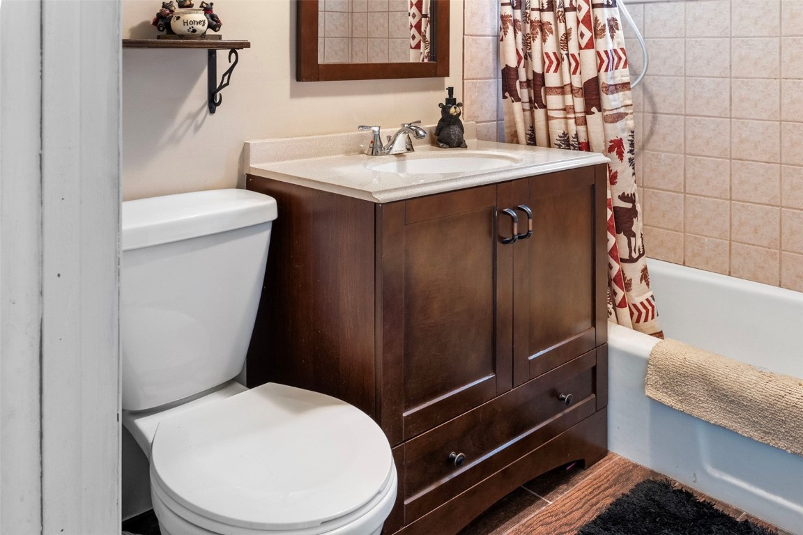 473 J Road Silverthorne, CO 80498 - Photo 16 of 38 a bathroom with a sink toilet and shower