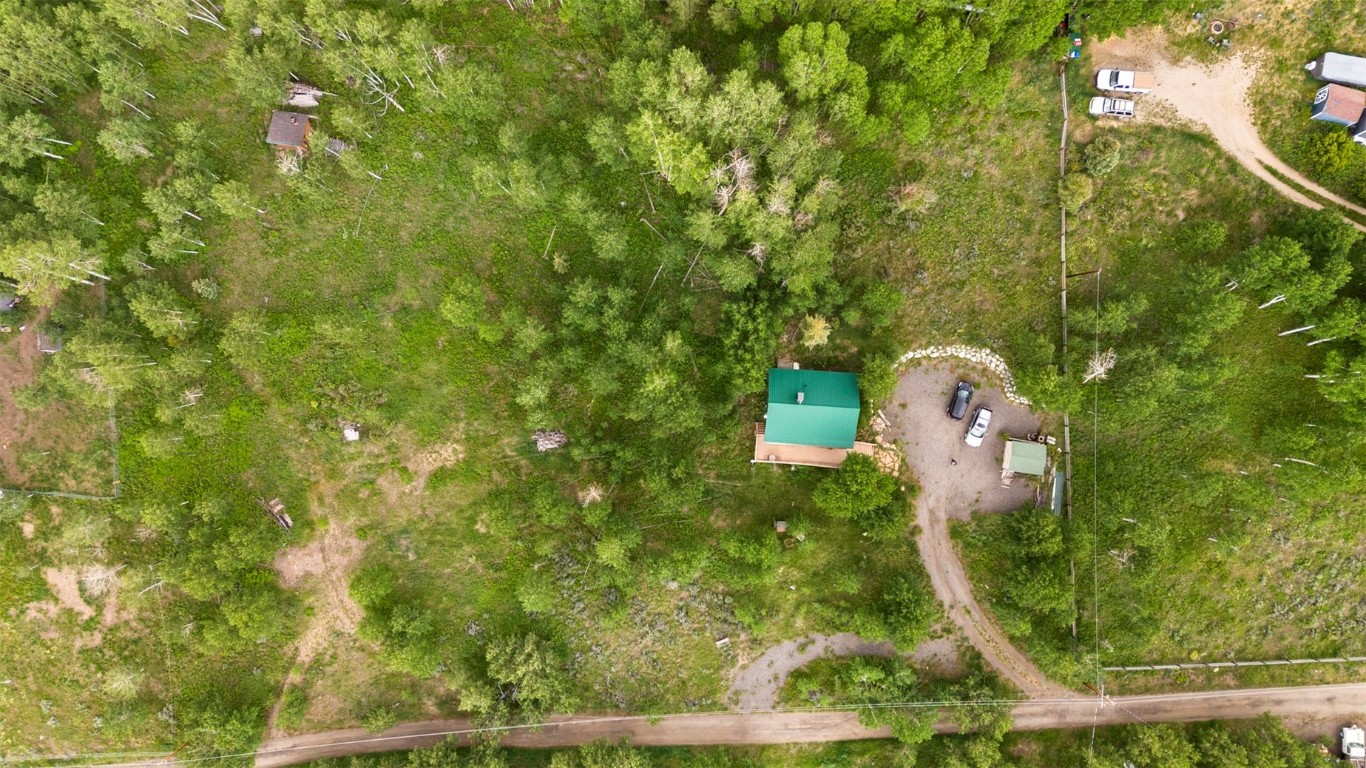 473 J Road Silverthorne, CO 80498 - Photo 26 of 38 an aerial view of a house with a yard and fountain