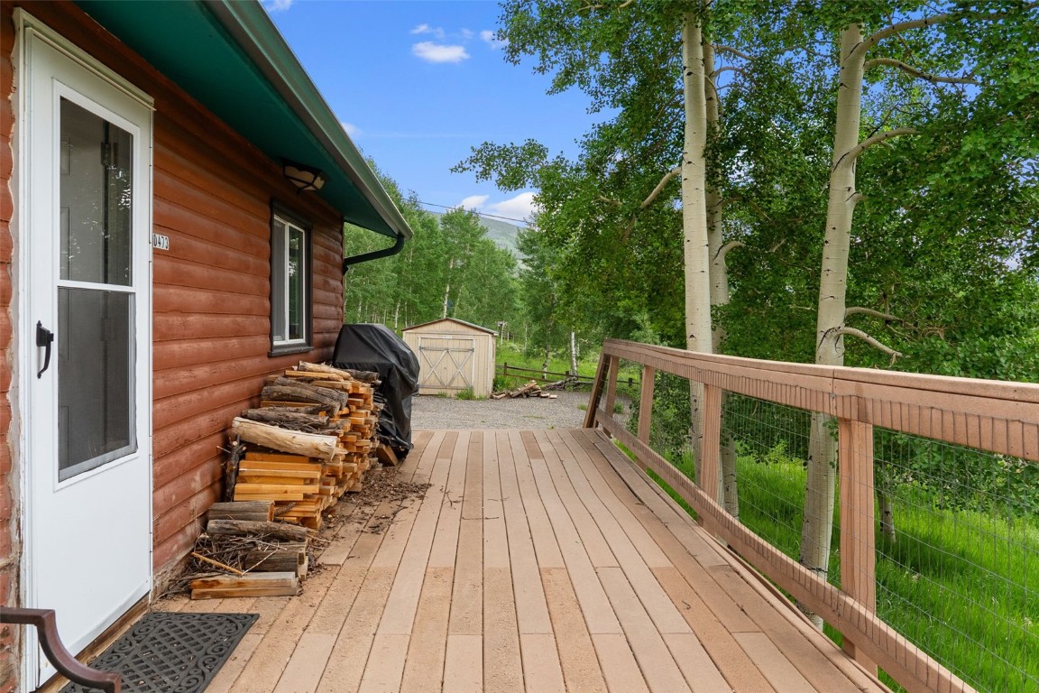 473 J Road Silverthorne, CO 80498 - Photo 28 of 38 a view of balcony with wooden floor and fence