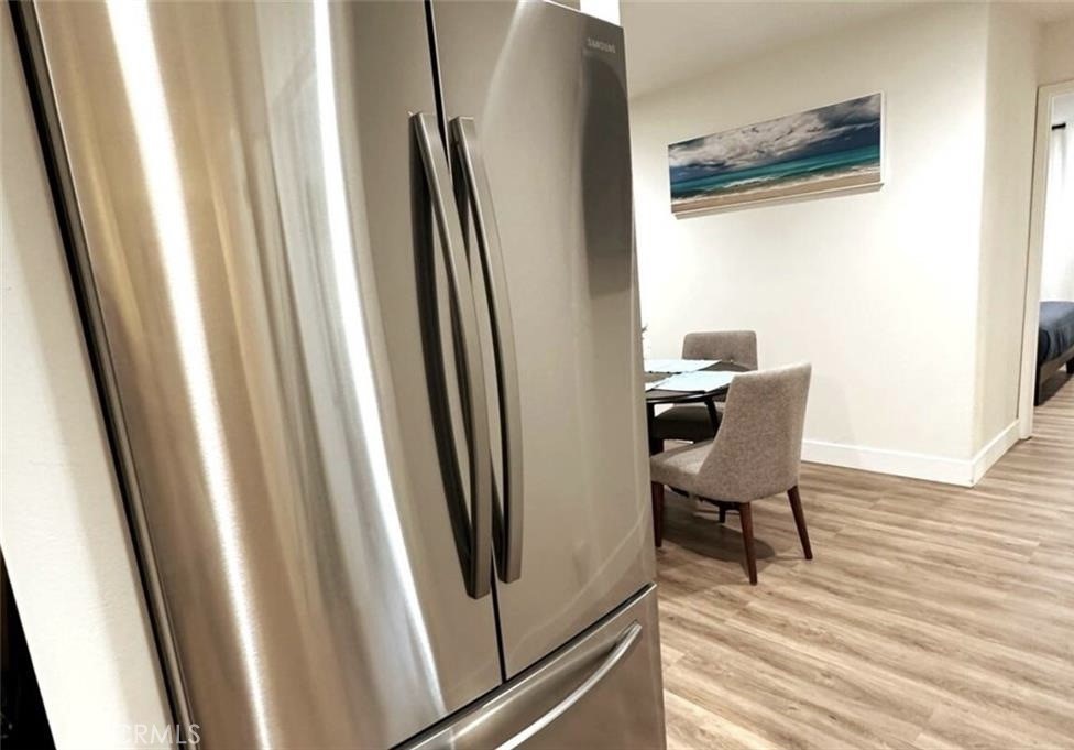 425 Lewis Place Placentia, CA 92870 - Photo 11 of 18 a view of a hallway with wooden floor and chair