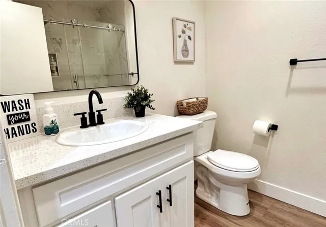 a bathroom with a sink and a toilet