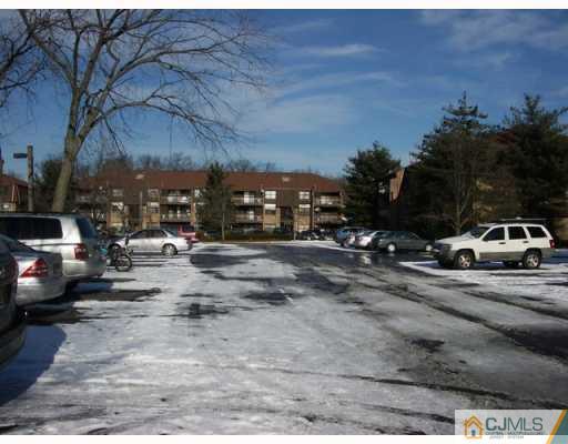 1537 Raspberry Court Edison, NJ 08817 - Photo 1 of 10 a view of street with parked cars