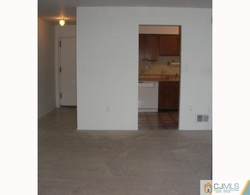 1537 Raspberry Court Edison, NJ 08817 - Photo 2 of 10 a view of a hallway with kitchen