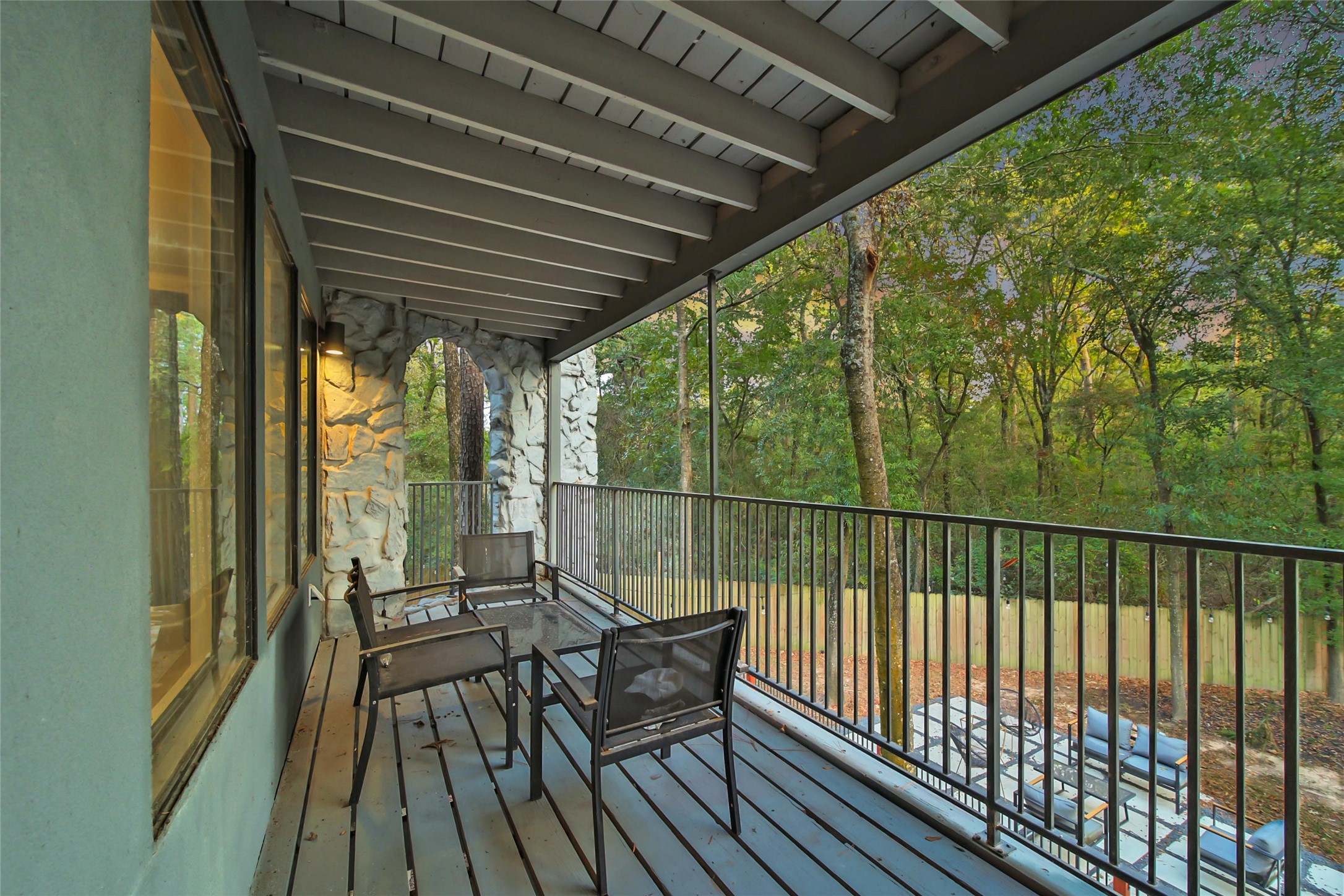 140 South Timber Top Drive Spring, TX 77380 - Photo 23 of 38 a view of balcony with wooden floor and outdoor seating
