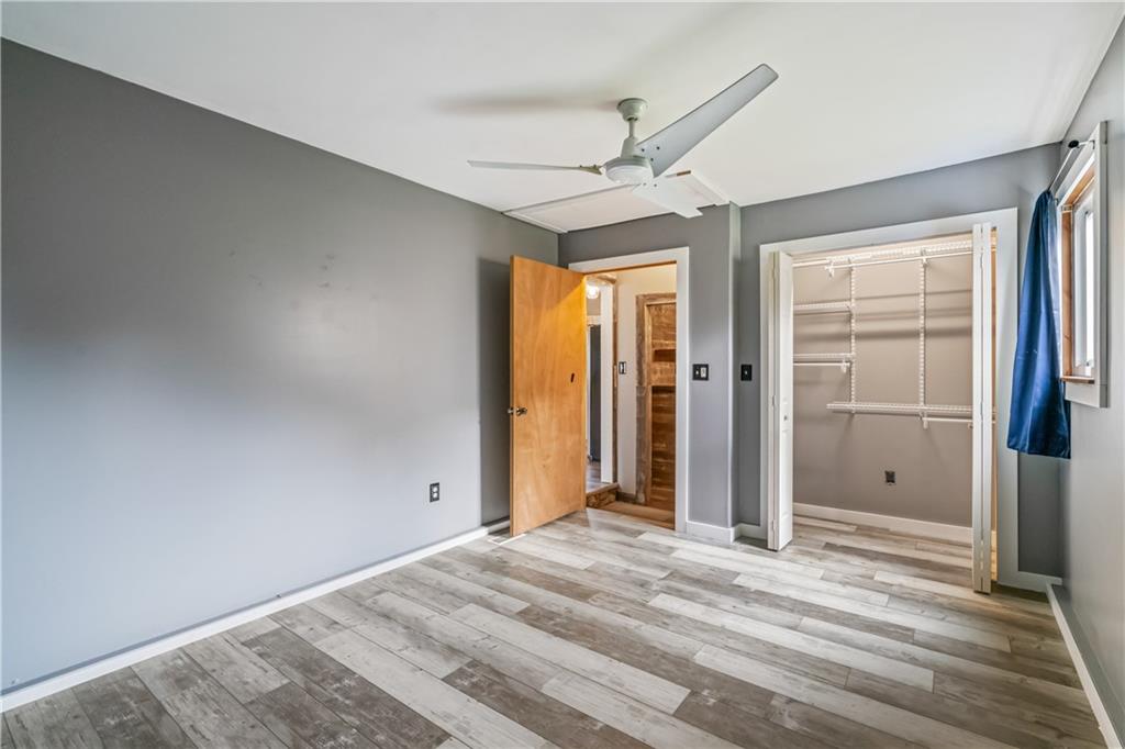 401 Rothey Drive Elizabeth, PA 15037 - Photo 13 of 17 a view of a room with wooden floor and ceiling fan