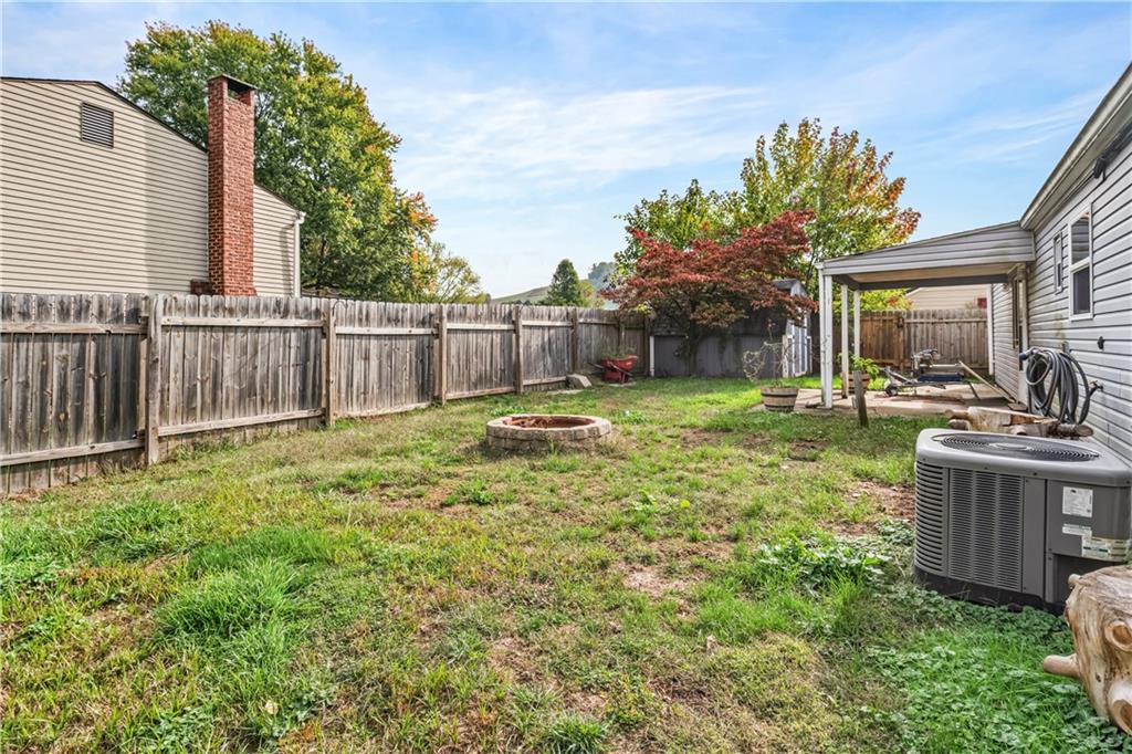 401 Rothey Drive Elizabeth, PA 15037 - Photo 17 of 17 a view of a backyard with a garden and deck
