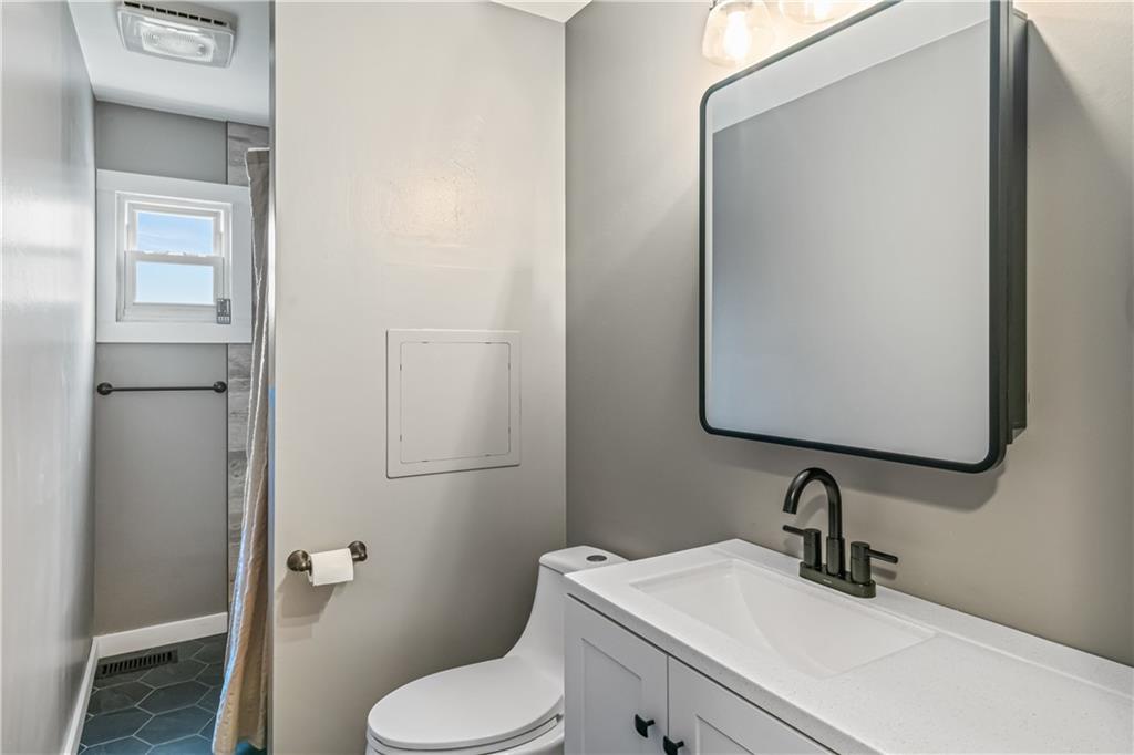 401 Rothey Drive Elizabeth, PA 15037 - Photo 9 of 17 a bathroom with a sink toilet and shower