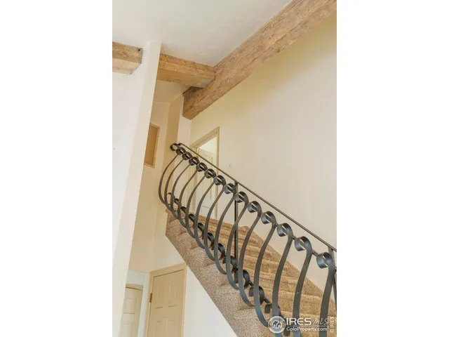 a view of an entryway with staircase