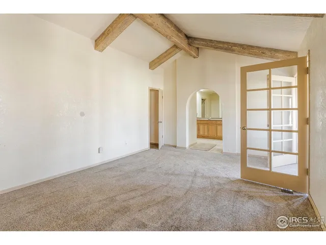 a bathroom with a sink a mirror and a shower