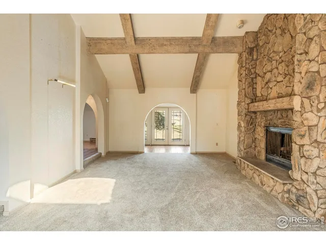 a view of a livingroom with a fireplace