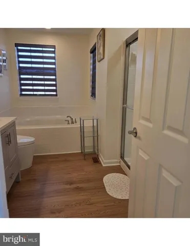a black and white photo of a living room