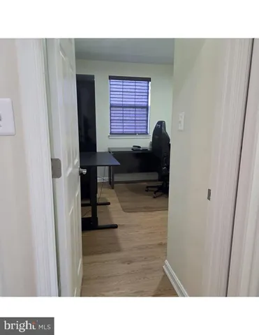 a room with a couch and a window