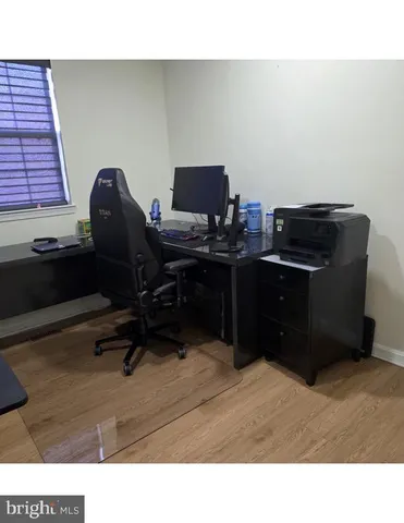 a room with a bed and a cabinets