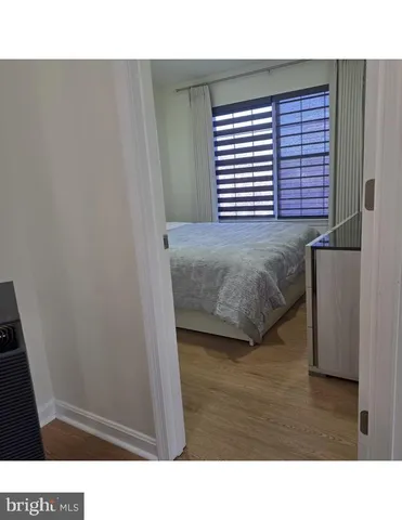 a bathroom with a sink a toilet a shower and a mirror