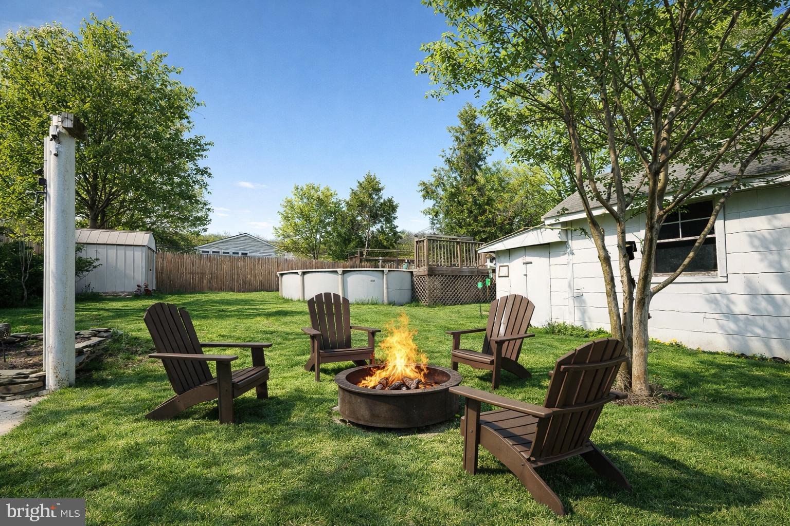 10 Cowl Court Baltimore, MD 21220 - Photo 8 of 33 Cozy fire pit in a lush backyard.
