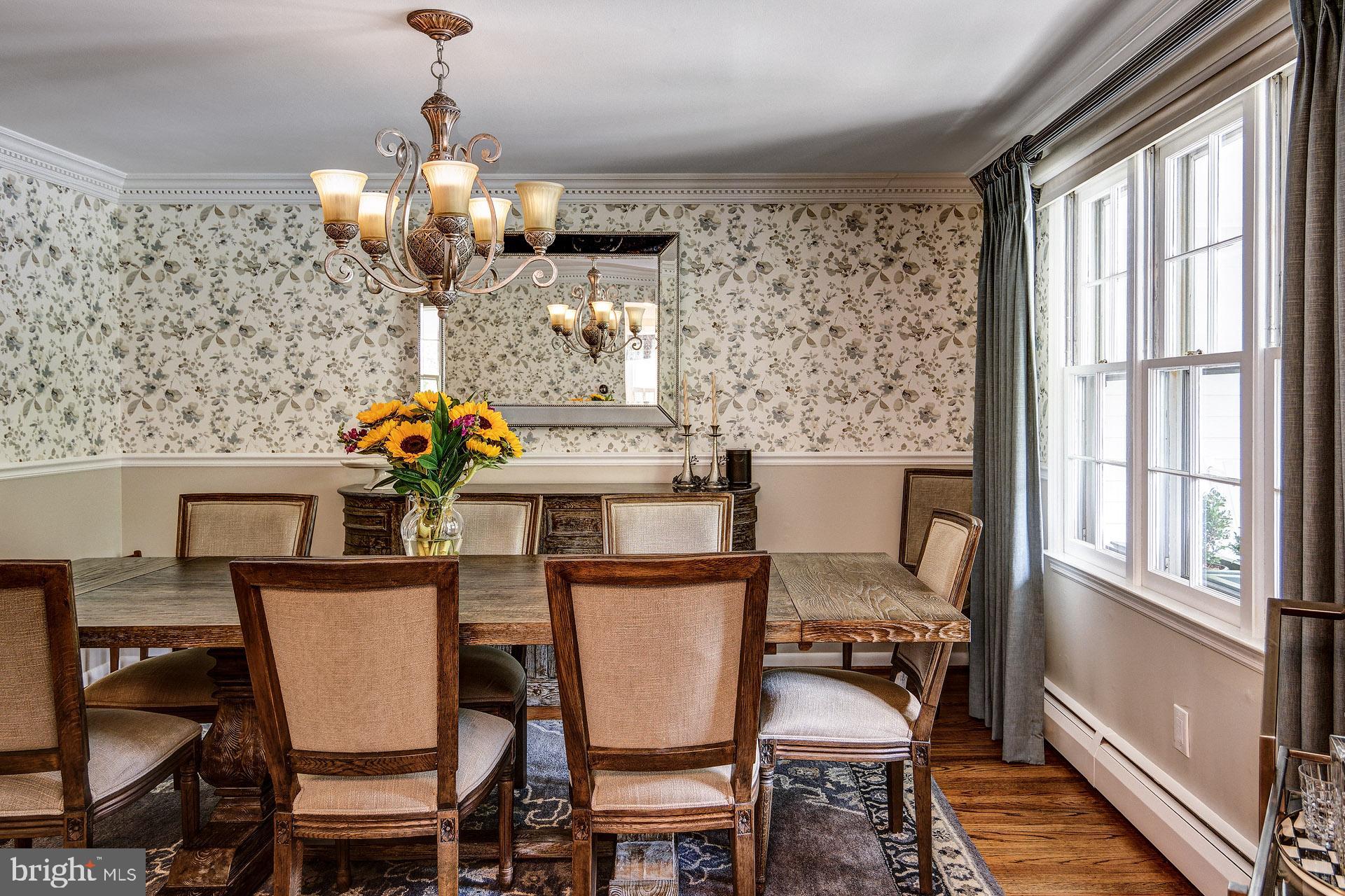 6 Heritage Road Haddonfield, NJ 08033 - Photo 21 of 61 a view of a dining room with furniture a chandelier and wooden floor