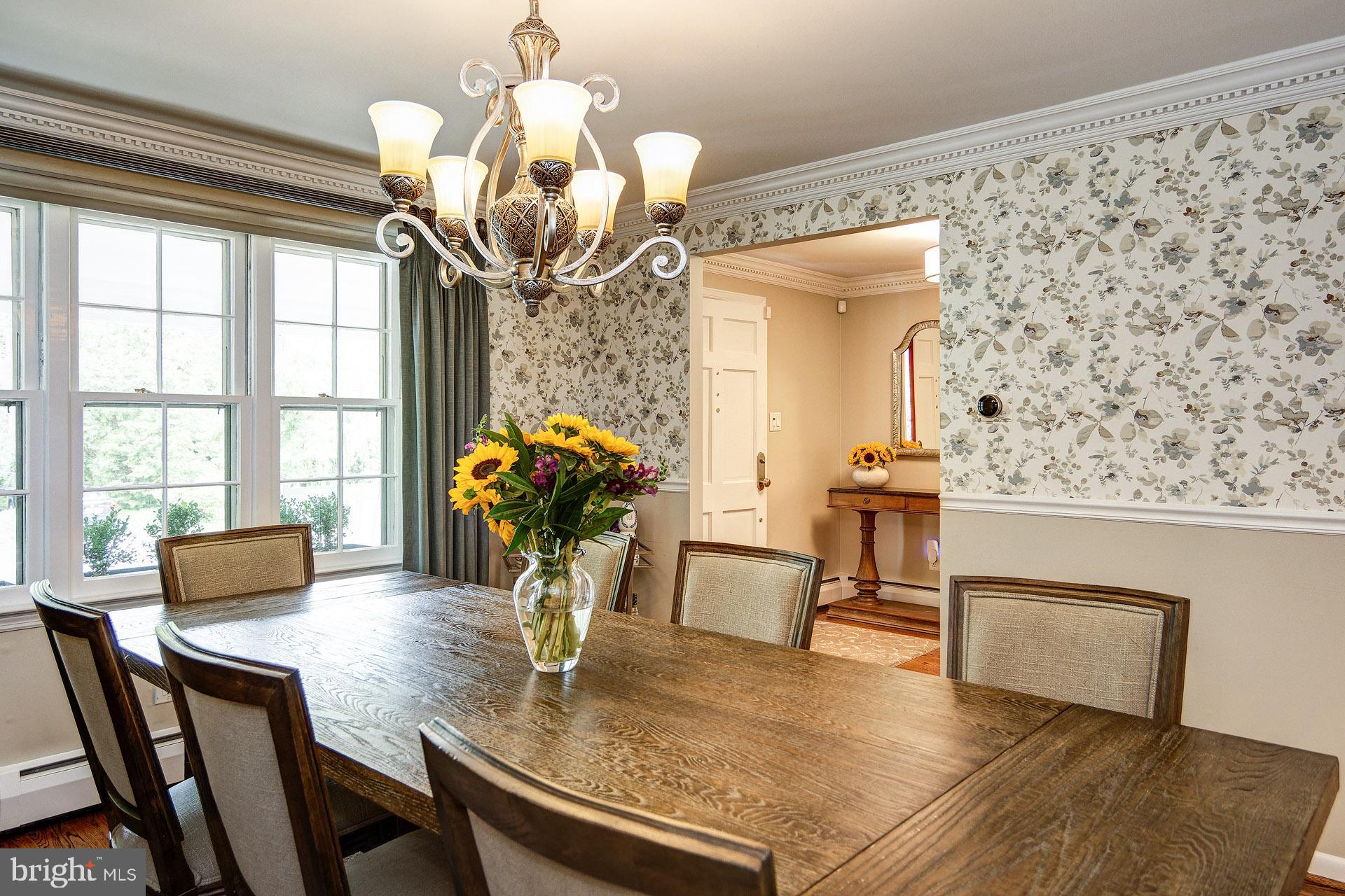 6 Heritage Road Haddonfield, NJ 08033 - Photo 24 of 61 a view of a dining room with furniture and a chandelier