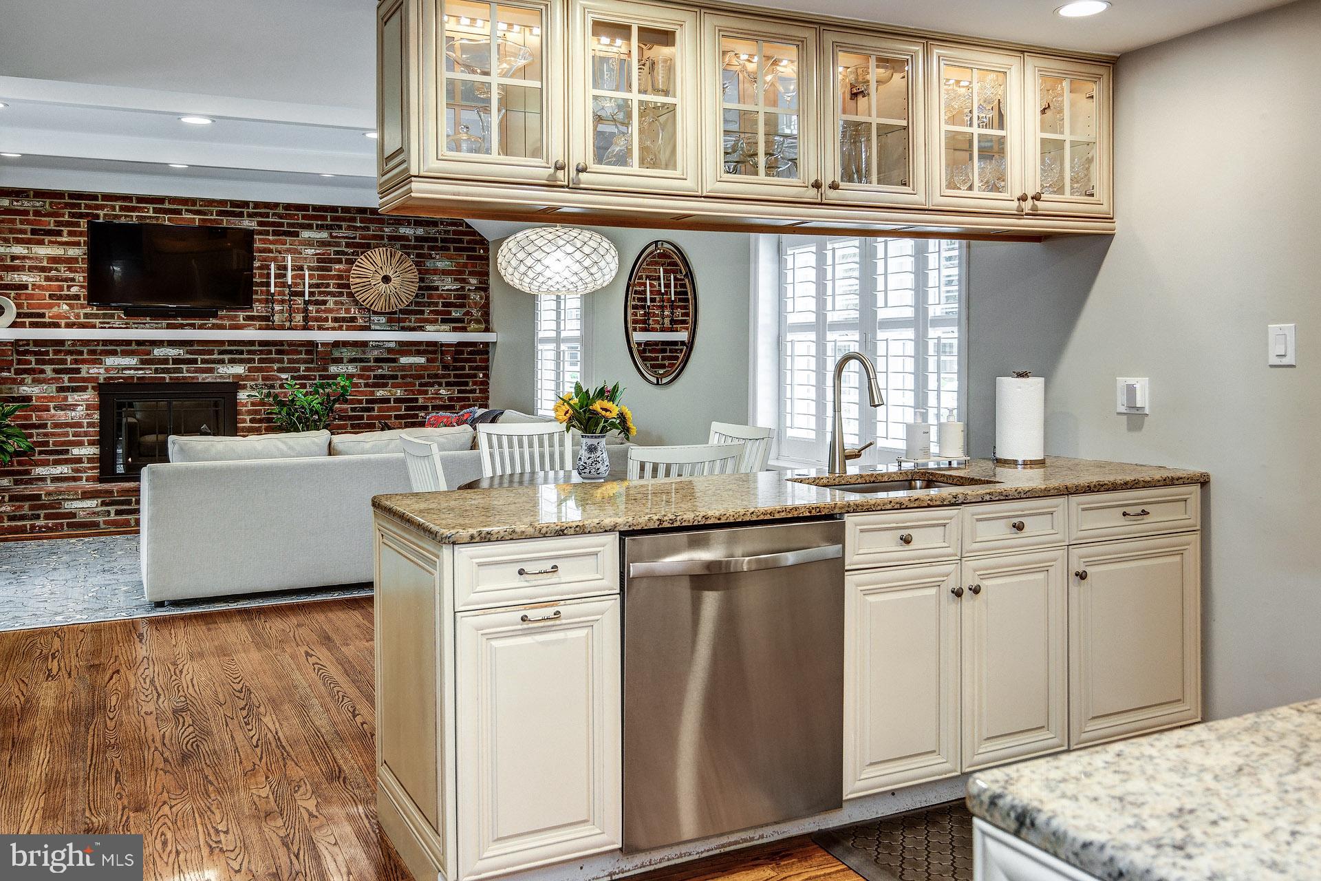 6 Heritage Road Haddonfield, NJ 08033 - Photo 25 of 61 a kitchen with stainless steel appliances granite countertop a stove and a sink