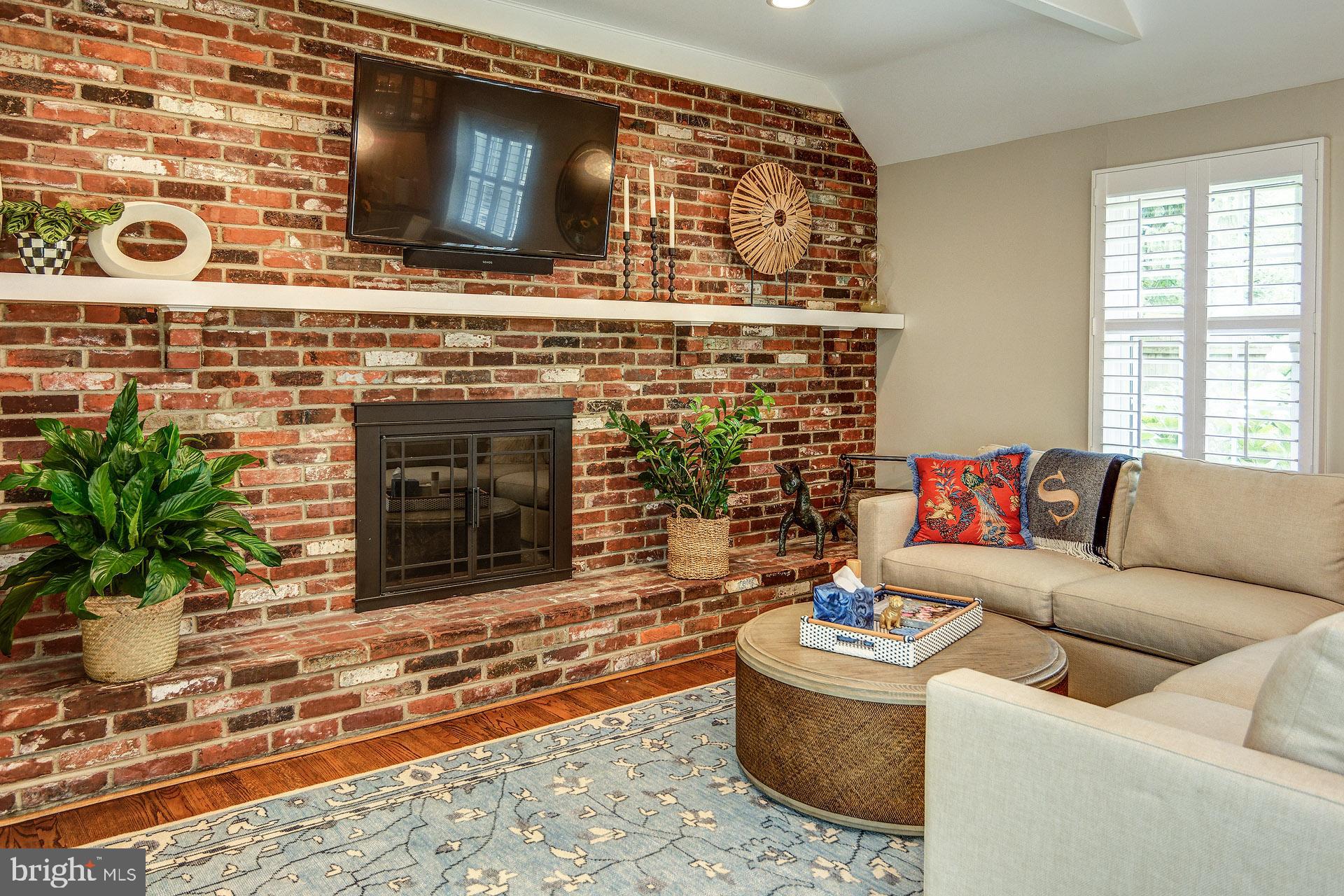6 Heritage Road Haddonfield, NJ 08033 - Photo 31 of 61 a living room with furniture and a fireplace