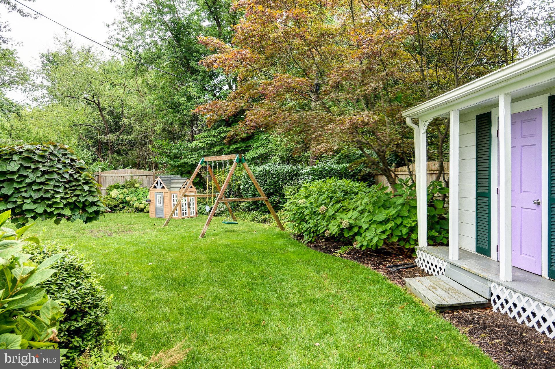 6 Heritage Road Haddonfield, NJ 08033 - Photo 10 of 61 a view of a backyard with table and chairs and potted plants