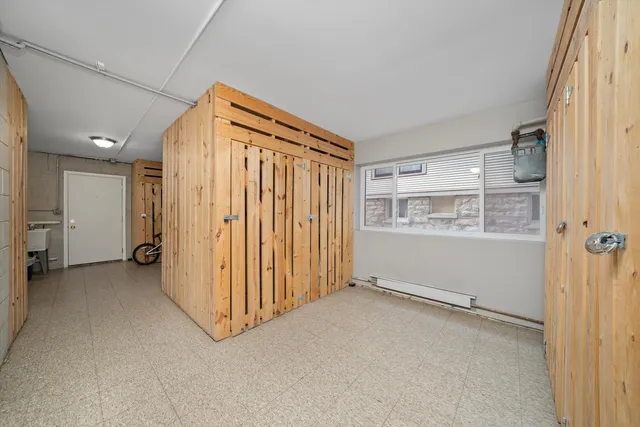 an empty room with closet area