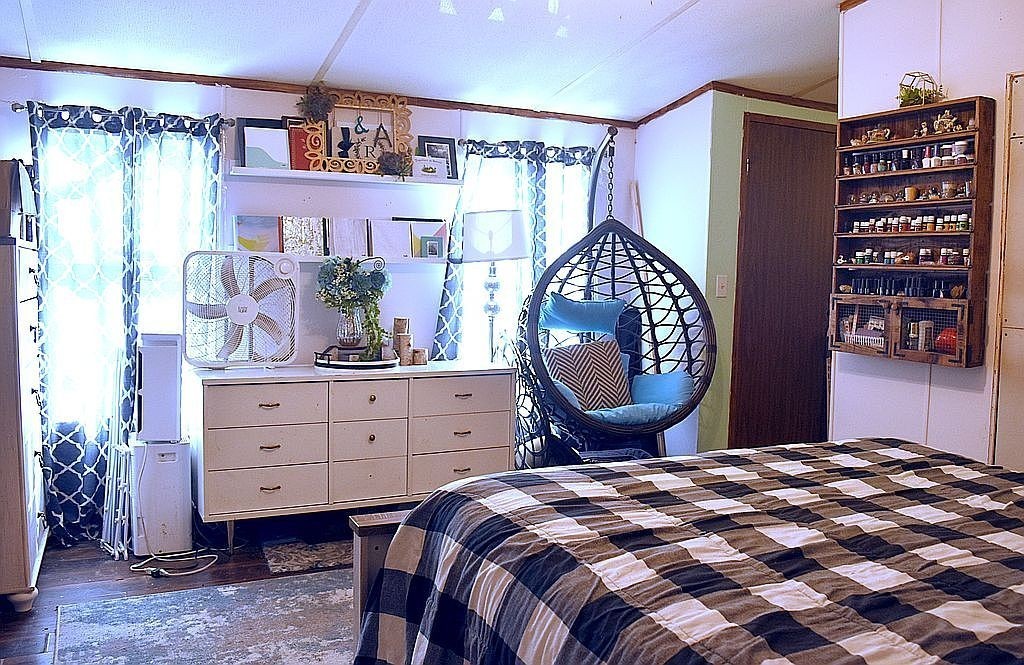 1661 Sassafras Stand Ridge Road Linden, TN 37096 - Photo 6 of 23 a bedroom with a bed and a dresser