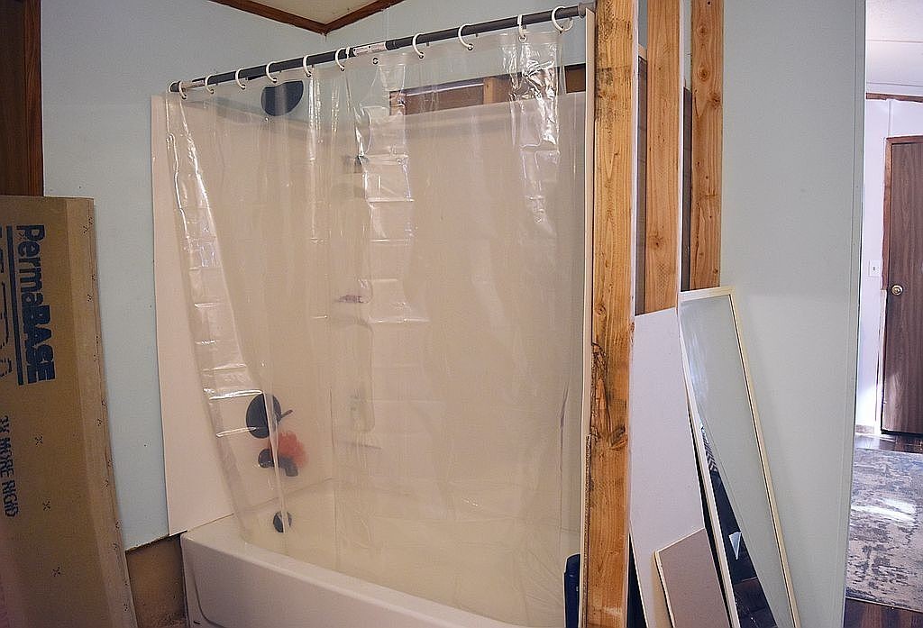 1661 Sassafras Stand Ridge Road Linden, TN 37096 - Photo 8 of 23 a bathroom with a shower and a tub