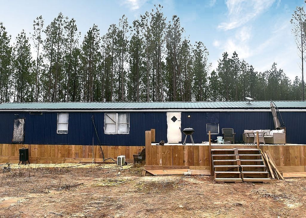 1661 Sassafras Stand Ridge Road Linden, TN 37096 - Photo 9 of 23 a view of a house with a patio