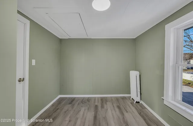 a kitchen with cabinets a sink and appliances