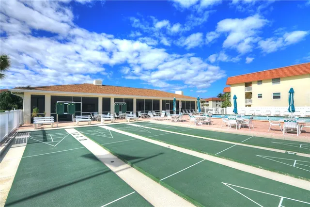 swimming pool with outdoor seating