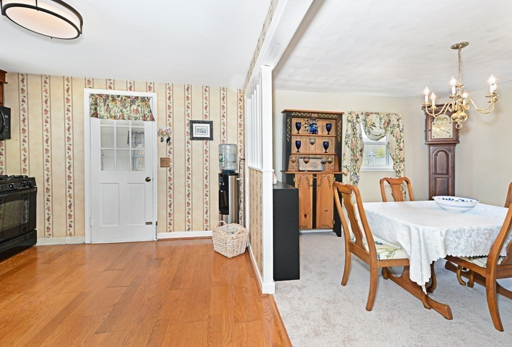 107 Causeway Street Hudson, MA 01749 - Photo 13 of 21 a view of a livingroom with furniture window and wooden floor